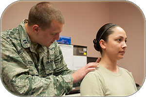 Family Medicine Residency (FMR) resident preparing a patient for acupuncture